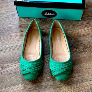 Green suede flats.